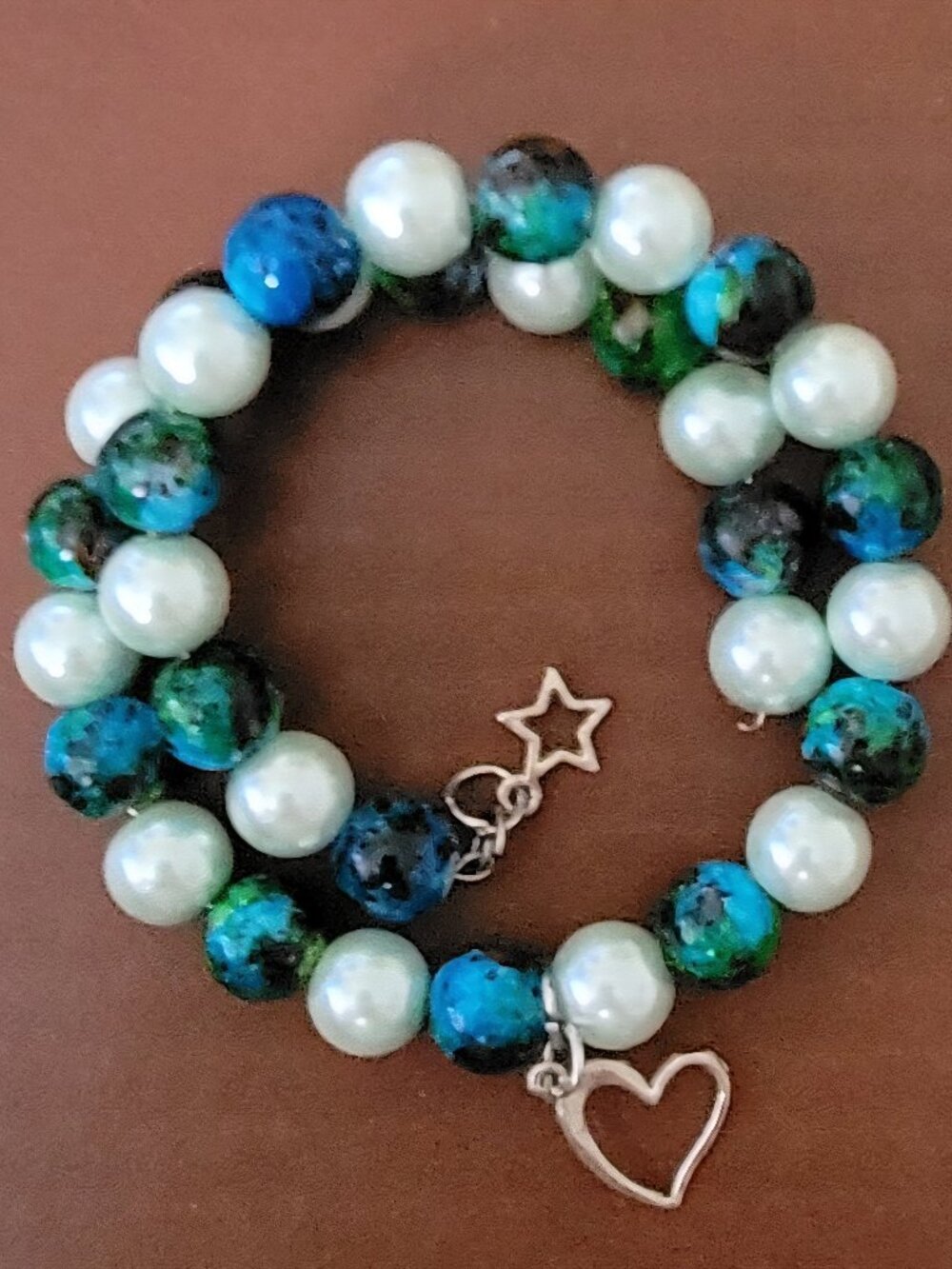 Multiple Colorful Beaded Wrist Wraps With Whimsical Charms